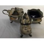 Silver three piece cruet set, salt with blue glass liner. 107.9 silver weight.