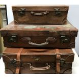 Three vintage suitcases, 2 leather with labels, largest 67 x 42cms.