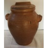 Large stoneware container jar with wooden lid. 43cms h.