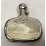 A Birmingham 1911 silver dram hip flask, William Neale and Son, 31.7gms.