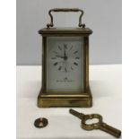Brass carriage clock, Matthew Norman, Swiss made with key (broken spring) 11cms h.