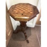 A 19th century inlaid walnut work table with chess board to top.
