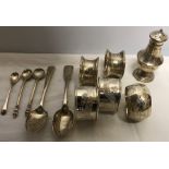 Silver spoons and pepperette, 2 napkin rings unmarked white metal.