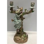 Continental ceramic figurine two branch candelabra, blue anchor mark.