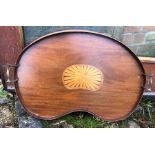 Edwardian mahogany kidney shaped inlaid tray with brass handles.