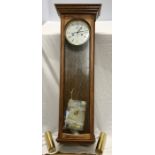 Oak cased weighted wall clock, Kieninger, Germany. 96 h x 33cms w.
