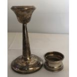Hallmarked small silver candlestick, 13cms with a silver napkin ring.
