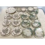Two part tea sets, falling leaf pattern, art deco style and Colclough Rose pattern 26 pieces.