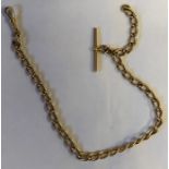 An 18ct gold watch chain with t-bar. 42.9gms. 33cms l.