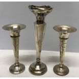 Three weighted silver vases, 23cms h.