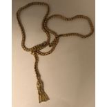 A 15 ct gold chain with tassel drop/ 24.8gms.