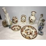 Five pieces Masons brown velvet including clock, plate, vase, ginger jar, two Nao figures,