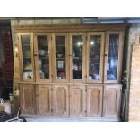 Large early 20thC pine cupboard, 6 cupboard doors.