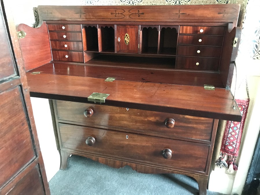 A 19thC mahogany inlaid secretaire, circa 1830 with well fitted interior and secret drawer with