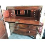 A 19thC mahogany inlaid secretaire, circa 1830 with well fitted interior and secret drawer with