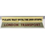 Two metal signs, London Transport and Wait Until The Bus Stops. 56 x 8cms.