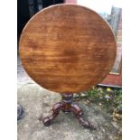 A 19thC tilt top table.