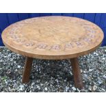 Gnomeman oak circular coffee table, tripod leg base, decorative carved top. 41.5cms h x 68.5cms w.