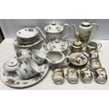 Aladdin fine china floral pattern tea set, 22 pieces and a Japanese Geisha girl pattern tea set,