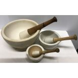 Three pestles & mortar, largest Wedgwood 31cms d. All good condition.
