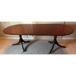 Reproduction twin pedestal mahogany dining table. Extended = 214cms, 148 w x 58 d x 90 h.