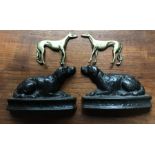 Pair of cast iron dog fireplace ornaments, Sancho and Ranger 13cms l together with 2 brass whippets.