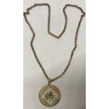 An early 20thC 9ct gold pendant and chain with Shamrock decoration with seed pearls. 8.2gms total.