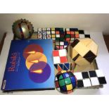 Eleven classic Rubik's Puzzles to include Rubik's clock and Parker Brothers Orb etc.