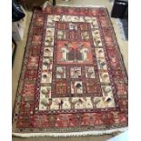 A silk and cotton Kilim, very good condition depicting cockerels. 188 x 123cms.