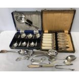 Boxed fish knives and forks, boxed dessert spoons and server and various other plated spoons etc.