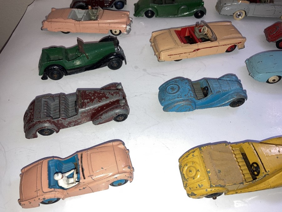 A large collection of playworn Dinky convertible cars to include Jaguar, Armstrong Siddelet, Sunbeam - Image 7 of 17