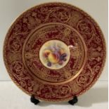 A Royal Worcester fruit decorated cabinet plate by P. Stanley decorated with peaches and brambles,