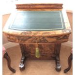 A 19thC burr walnut davenport desk, Green tooled leather top. 56cms w.