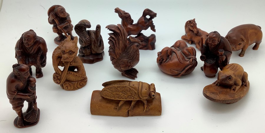 Twenty eight various modern Chinese wood and tagua nut and resin netsukes. Condition ReportTwo - Image 3 of 6