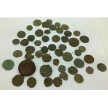 A quantity of uncleaned Roman coins.