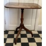 A Georgian mahogany tip top table, 47 x 61 x 71cms h, umbrella base, one piece top and all