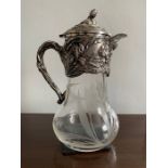 A superb quality Art Nouveau style claret jug, unmarked white metal mounts and engraved glass with