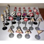 A large collection of Dinky playworn road signs and traffic lights to include no entry, Dager, 30,