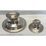 Two silver Capstan inkwells, larger, Birmingham 1920, 14cms d. Condition ReportSlight crack to lid