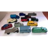 A large collection of Dinky playworn vehicles to include Austin Taxi 40H, Telephone Service Van 251,