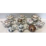 Ten Franklin Mint miniature teapots based on collections in the Victoria and Albert Museum, many