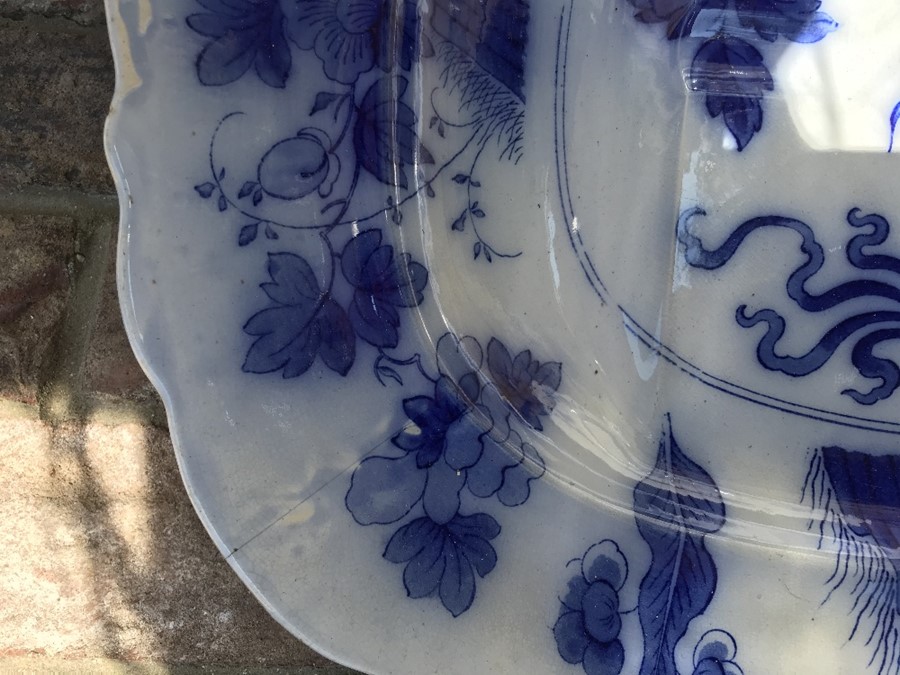 Three large meat platters,the blue and white having slight crack. Largest 43 x 53cms. - Image 2 of 3