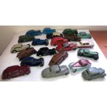 A large collection of Dinky playworn vehicles to include Austin Devon, Jaguar, Vauxhall Cresta
