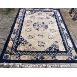 A good quality Chinese wool rug, 245 x 171cms bought in 1995 for £595.00, some marks otherwise in