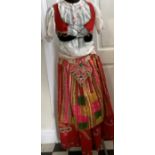 A vintage costume to include skirt, apron, blouse, waistcoat, hand embroidered, fits mannequin, size