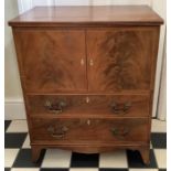 A 19thC mahogany bedside cupboard with two doors over 2 drawers on bracket feet.73 h x 63 w x