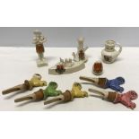 Five pieces of various crested china, Carlton, Shelley etc with 5 Solian ware spirit pourers.