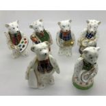 Six Royal Crown Derby Teddy Bears to include Christmas Cook Bear, 9cms h. All good condition.