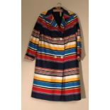 A 1960's ladies striped coat with large mother of pearl buttons. Condition ReportUnderarm lining a/