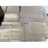 A large quantity of vintage linen and cotton pillowcases, some unused together with sheets...